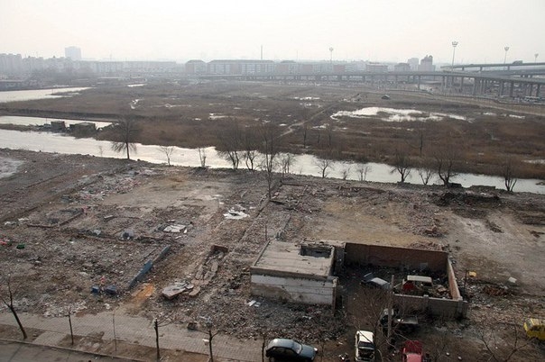 Рекультивация мусорной свалки в Китае