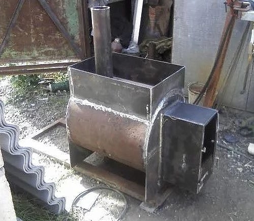 Железная печь для бани своими руками на основе трубы диаметром 50 сантиметров.